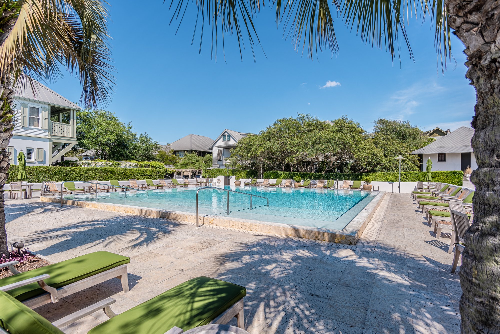 Rosemary Beach community pool with palm trees